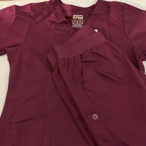 Wonder Wink scrub set in Maroon color size SMALL -top MEDIUM -bottom